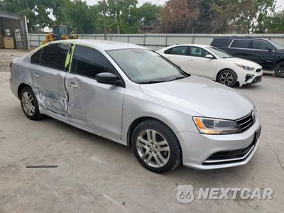Czwarte zdjęcie samochodu z boku: 2015 VOLKSWAGEN JETTA BASE VIN:3VW2K7AJ0FM232992 - miniatura