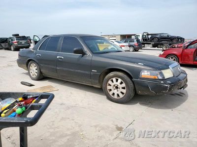 Czwarte zdjęcie samochodu z boku: 2005 MERCURY GRAND MARQUIS LS VIN:2MEHM75W65X656384 - miniatura