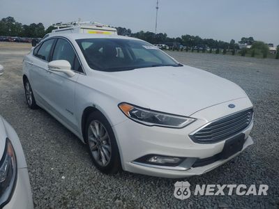 Czwarte zdjęcie samochodu z boku: 2017 FORD FUSION SE HYBRID VIN:3FA6P0LUXHR409581 - miniatura
