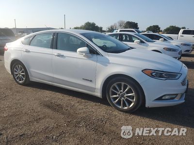 Czwarte zdjęcie samochodu z boku: 2017 FORD FUSION SE HYBRID VIN:3FA6P0LU3HR409499 - miniatura