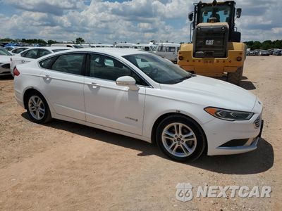 Czwarte zdjęcie samochodu z boku: 2018 FORD FUSION SE HYBRID VIN:3FA6P0LU3JR171871 - miniatura