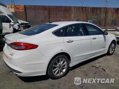 Trzecie zdjęcie samochodu z tyłu: 2017 FORD FUSION SE HYBRID VIN:3FA6P0LU3HR409308 - miniatura