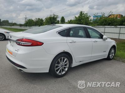 Trzecie zdjęcie samochodu z tyłu: 2017 FORD FUSION SE HYBRID VIN:3FA6P0LUXHR409452 - miniatura