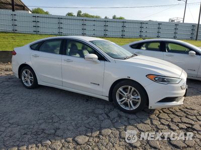 Czwarte zdjęcie samochodu z boku: 2018 FORD FUSION SE HYBRID VIN:3FA6P0LU4JR278718 - miniatura