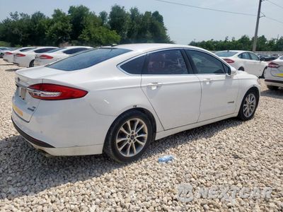 Trzecie zdjęcie samochodu z tyłu: 2017 FORD FUSION SE HYBRID VIN:3FA6P0LU9HR409040 - miniatura