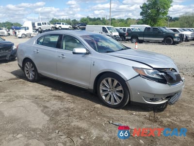 Czwarte zdjęcie samochodu z boku: 2013 LINCOLN MKS VIN:1LNHL9FT9DG604123 - miniatura