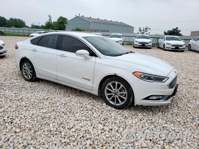 Czwarte zdjęcie samochodu z boku: 2017 FORD FUSION SE HYBRID VIN:3FA6P0LU7HR409554 - miniatura