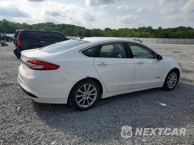 Trzecie zdjęcie samochodu z tyłu: 2017 FORD FUSION SE HYBRID VIN:3FA6P0LU7HR359674 - miniatura