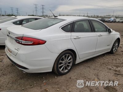 Trzecie zdjęcie samochodu z tyłu: 2017 FORD FUSION SE HYBRID VIN:3FA6P0LU4HR409060 - miniatura