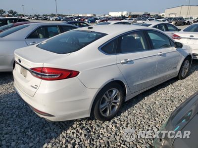 Trzecie zdjęcie samochodu z tyłu: 2018 FORD FUSION SE HYBRID VIN:3FA6P0LU0JR171732 - miniatura