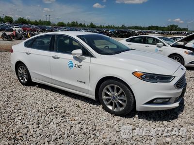 Czwarte zdjęcie samochodu z boku: 2017 FORD FUSION SE HYBRID VIN:3FA6P0LUXHR409077 - miniatura