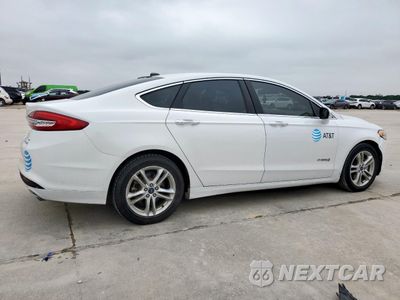 Trzecie zdjęcie samochodu z tyłu: 2018 FORD FUSION SE HYBRID VIN:3FA6P0LU9JR171826 - miniatura