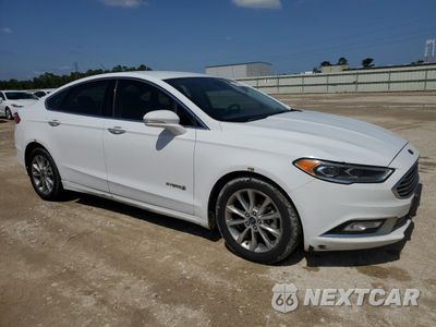 Czwarte zdjęcie samochodu z boku: 2017 FORD FUSION SE HYBRID VIN:3FA6P0LU8HR409028 - miniatura