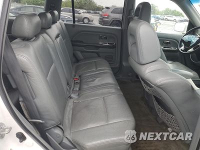 Zdjęcie 11 z 14 samochodu: 2004 HONDA PILOT EXL VIN:2HKYF18704H606268 - miniatura