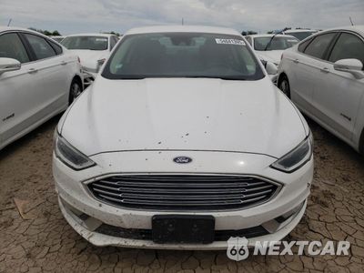 Piąte zdjęcie samochodu w środku: 2017 FORD FUSION SE HYBRID VIN:3FA6P0LU3HR409079 - miniatura