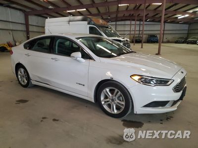 Czwarte zdjęcie samochodu z boku: 2018 FORD FUSION SE HYBRID VIN:3FA6P0LUXJR171799 - miniatura