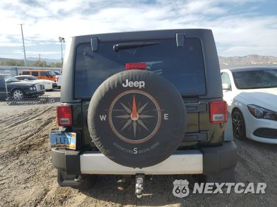 Zdjęcie 6 z 12 samochodu: 2011 JEEP WRANGLER UNLIMITED SAHARA VIN:1J4HA5H14BL532700 - miniatura