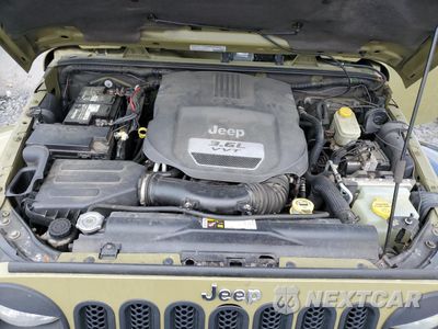 Zdjęcie 12 z 14 samochodu: 2013 JEEP WRANGLER UNLIMITED SAHARA VIN:1C4HJWEG4DL583914 - miniatura