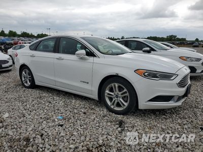 Czwarte zdjęcie samochodu z boku: 2018 FORD FUSION SE HYBRID VIN:3FA6P0LU0JR171858 - miniatura