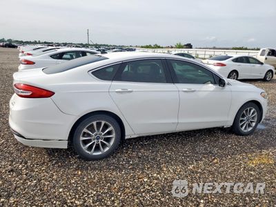 Trzecie zdjęcie samochodu z tyłu: 2017 FORD FUSION SE HYBRID VIN:3FA6P0LU5HR409004 - miniatura