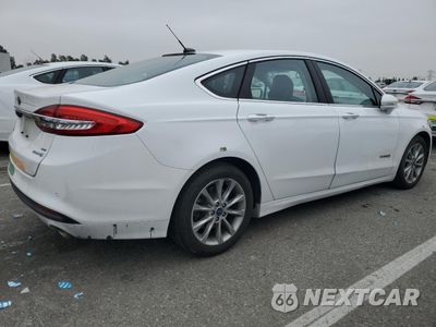 Trzecie zdjęcie samochodu z tyłu: 2017 FORD FUSION SE HYBRID VIN:3FA6P0LU1HR409727 - miniatura