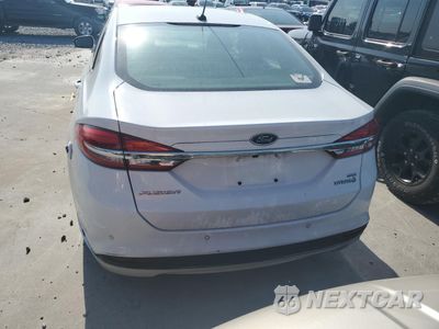 Zdjęcie 6 z 12 samochodu: 2018 FORD FUSION SE HYBRID VIN:3FA6P0LU5JR118606 - miniatura