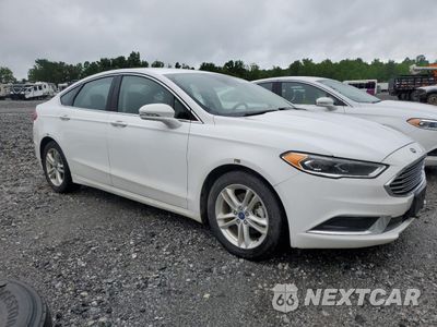 Czwarte zdjęcie samochodu z boku: 2018 FORD FUSION SE HYBRID VIN:3FA6P0LU5JR171774 - miniatura