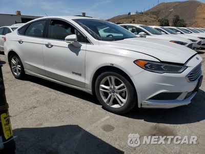 Czwarte zdjęcie samochodu z boku: 2018 FORD FUSION SE HYBRID VIN:3FA6P0LU3JR172129 - miniatura
