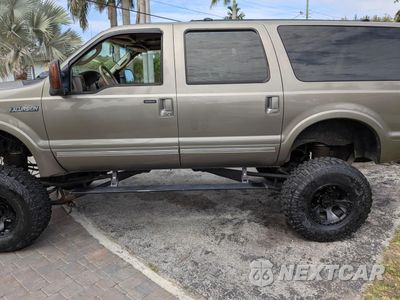 Zdjęcie 14 z 15 samochodu: 2004 FORD EXCURSION LIMITED VIN:1FMSU43P44EA56041 - miniatura