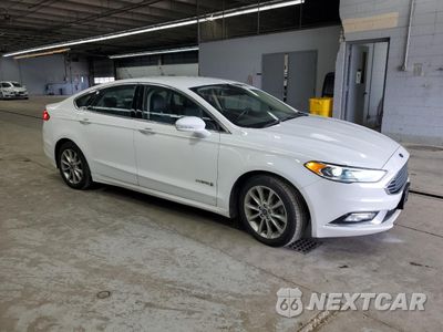 Czwarte zdjęcie samochodu z boku: 2017 FORD FUSION SE HYBRID VIN:3FA6P0LU2HR409414 - miniatura