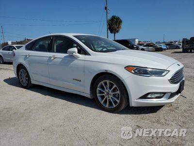 Czwarte zdjęcie samochodu z boku: 2017 FORD FUSION SE HYBRID VIN:3FA6P0LU8HR410048 - miniatura