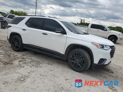 Czwarte zdjęcie samochodu z boku: 2018 CHEVROLET TRAVERSE PREMIER VIN:1GNERKKW3JJ204495 - miniatura