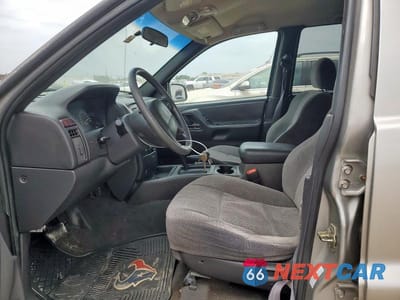 Zdjęcie 7 z 12 samochodu: 2001 JEEP GRAND CHEROKEE VIN:1J4GX48S41C549721 - miniatura