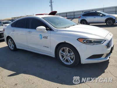 Czwarte zdjęcie samochodu z boku: 2018 FORD FUSION SE HYBRID VIN:3FA6P0LU9JR152452 - miniatura