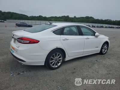 Trzecie zdjęcie samochodu z tyłu: 2017 FORD FUSION SE HYBRID VIN:3FA6P0LU9HR410088 - miniatura