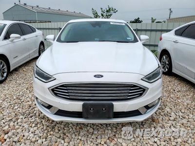 Piąte zdjęcie samochodu w środku: 2017 FORD FUSION SE HYBRID VIN:3FA6P0LUXHR409550 - miniatura