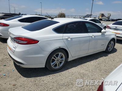 Trzecie zdjęcie samochodu z tyłu: 2018 FORD FUSION SE HYBRID VIN:3FA6P0LU2JR278622 - miniatura