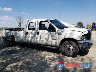 Czwarte zdjęcie samochodu z boku: 2002 FORD F350 SUPER DUTY VIN:1FTWW33F42EB14633 - miniatura