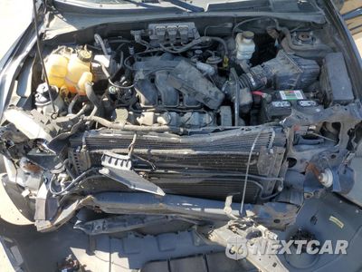 Zdjęcie 12 z 13 samochodu: 2005 FORD ESCAPE LIMITED VIN:1FMCU04105KA65104 - miniatura