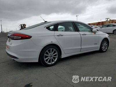 Trzecie zdjęcie samochodu z tyłu: 2017 FORD FUSION SE HYBRID VIN:3FA6P0LU7HR409750 - miniatura