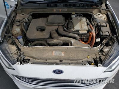 Zdjęcie 11 z 13 samochodu: 2018 FORD FUSION SE HYBRID VIN:3FA6P0LU1JR129831 - miniatura