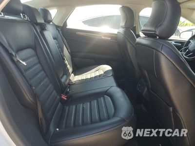 Zdjęcie 10 z 13 samochodu: 2017 FORD FUSION SE HYBRID VIN:3FA6P0LUXHR409113 - miniatura