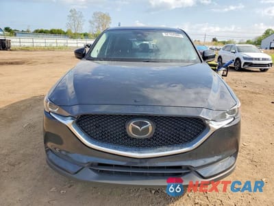 Piąte zdjęcie samochodu w środku: 2021 MAZDA CX-5 TOURING VIN:JM3KFBCMXM1406344 - miniatura