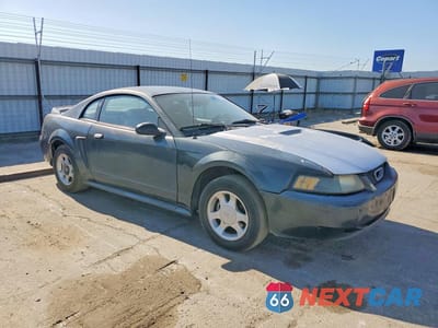 Czwarte zdjęcie samochodu z boku: 1999 FORD MUSTANG VIN:1FAFP4043XF193810 - miniatura