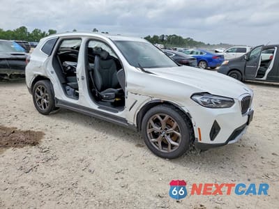 Czwarte zdjęcie samochodu z boku: 2022 BMW X3 VIN:5UX43DP05N9K48087 - miniatura