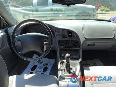Zdjęcie 9 z 10 samochodu: 1996 MITSUBISHI ECLIPSE SPYDER GS VIN:4A3AX35G7TE410564 - miniatura