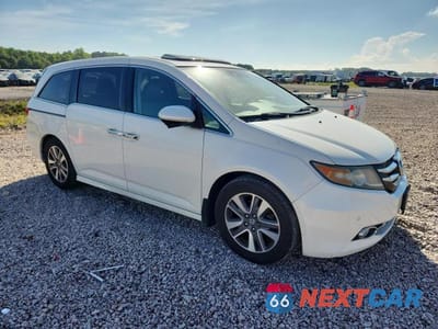 Czwarte zdjęcie samochodu z boku: 2016 HONDA ODYSSEY TOURING VIN:5FNRL5H97GB001558 - miniatura