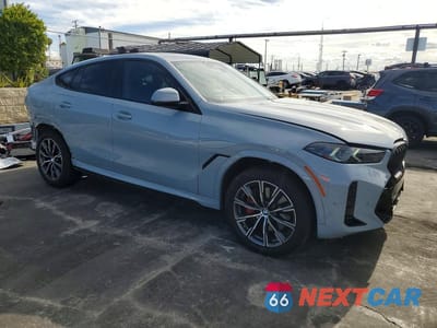 Czwarte zdjęcie samochodu z boku: 2025 BMW X6 XDRIVE40I VIN:5UX33EX05S9Z19738 - miniatura
