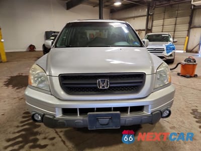 Piąte zdjęcie samochodu w środku: 2005 HONDA PILOT EXL VIN:5FNYF186X5B041633 - miniatura
