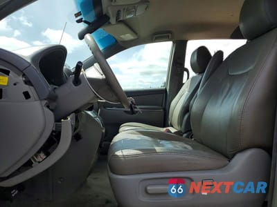 Zdjęcie 7 z 14 samochodu: 2010 TOYOTA SIENNA LE 8-PASSENGER VIN:5TDKK4CC3AS321125 - miniatura